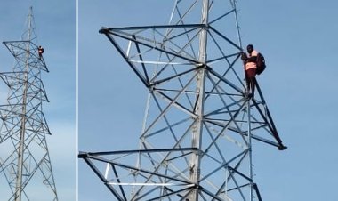 நீர் பிடிப்பு  பகுதியில் உள்ள டவர்களை அகற்ற வலியுறுத்தி நூறு அடி உயர மின் கோபுரத்தில் ஏறி வாலிபர் போராட்டம்!